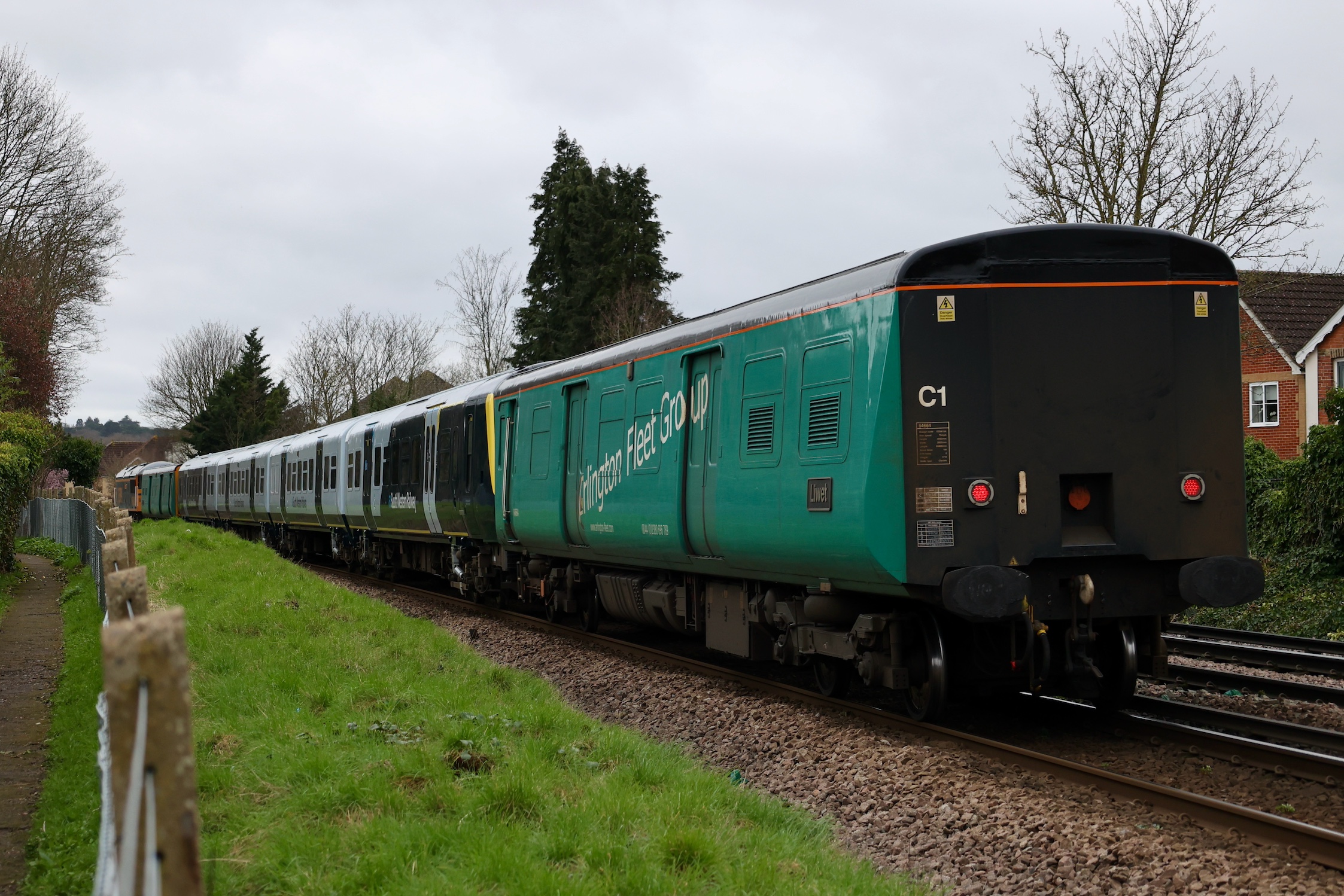 Arlington Fleet Services Class 508 barrier coach 64664 trailing