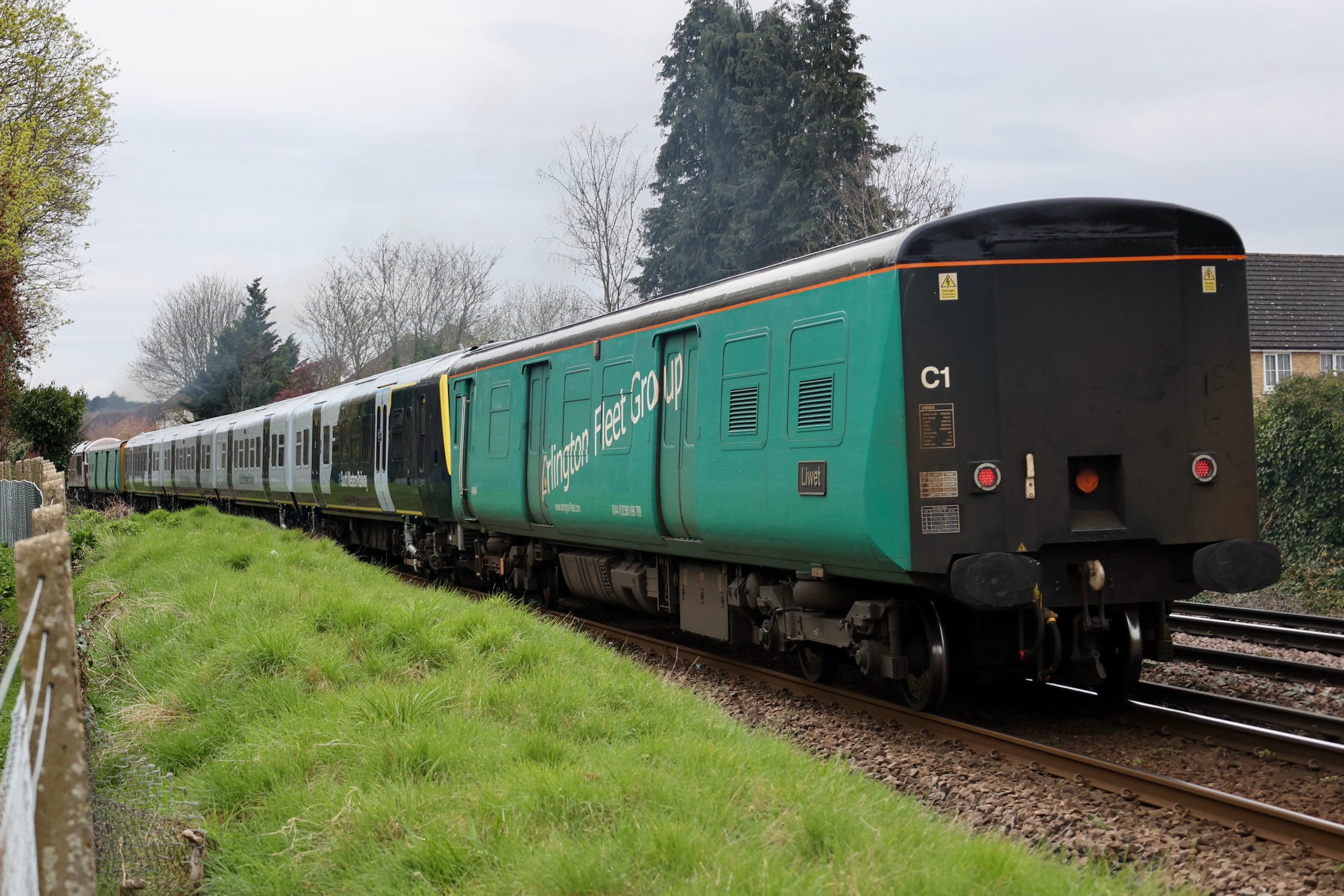 Arlington Fleet Services Class 508 barrier coach 64664 trailing
