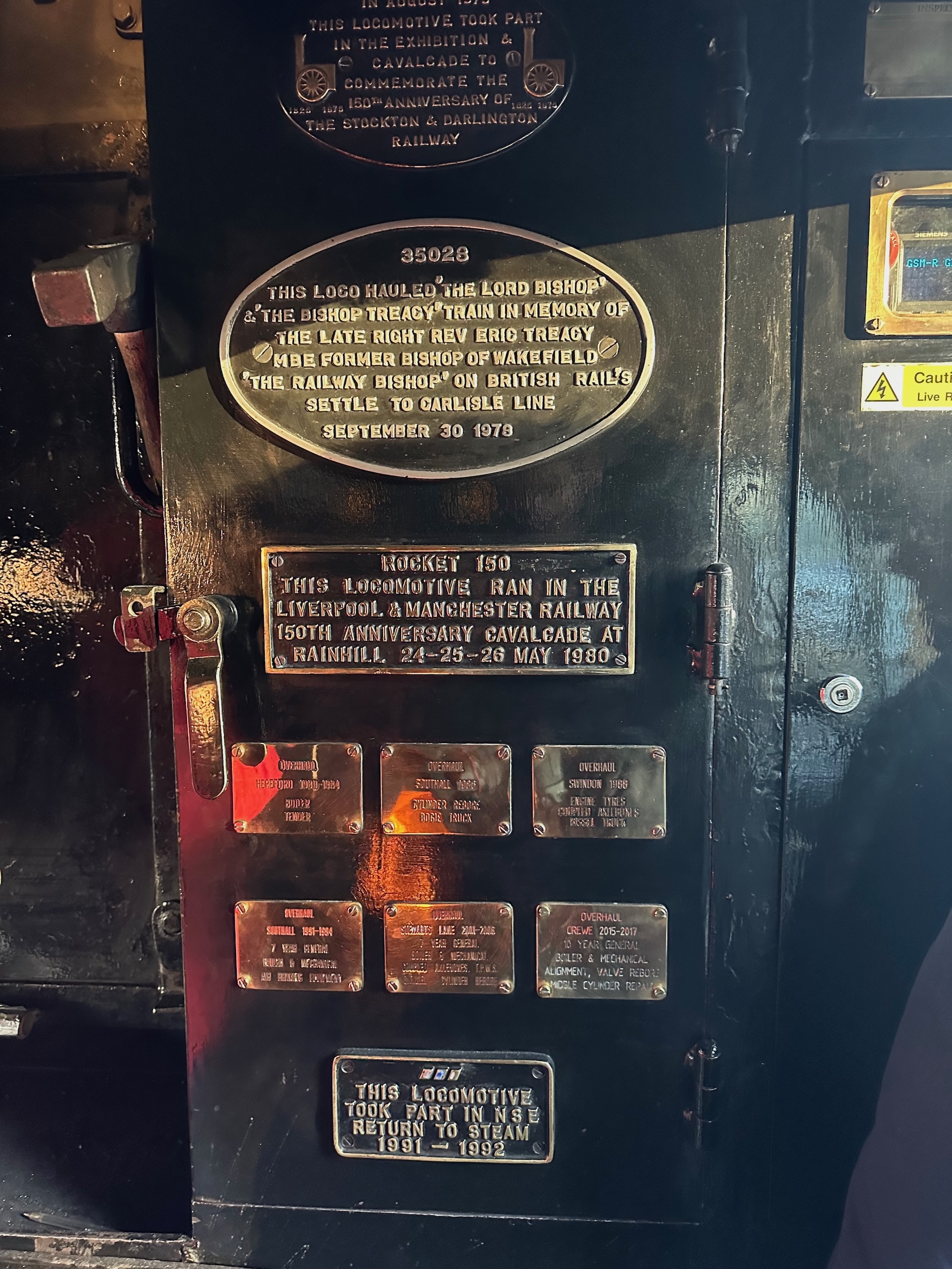 The plaques on the tender marking various events 35028 has taken part in and overhauls of the locomotive.