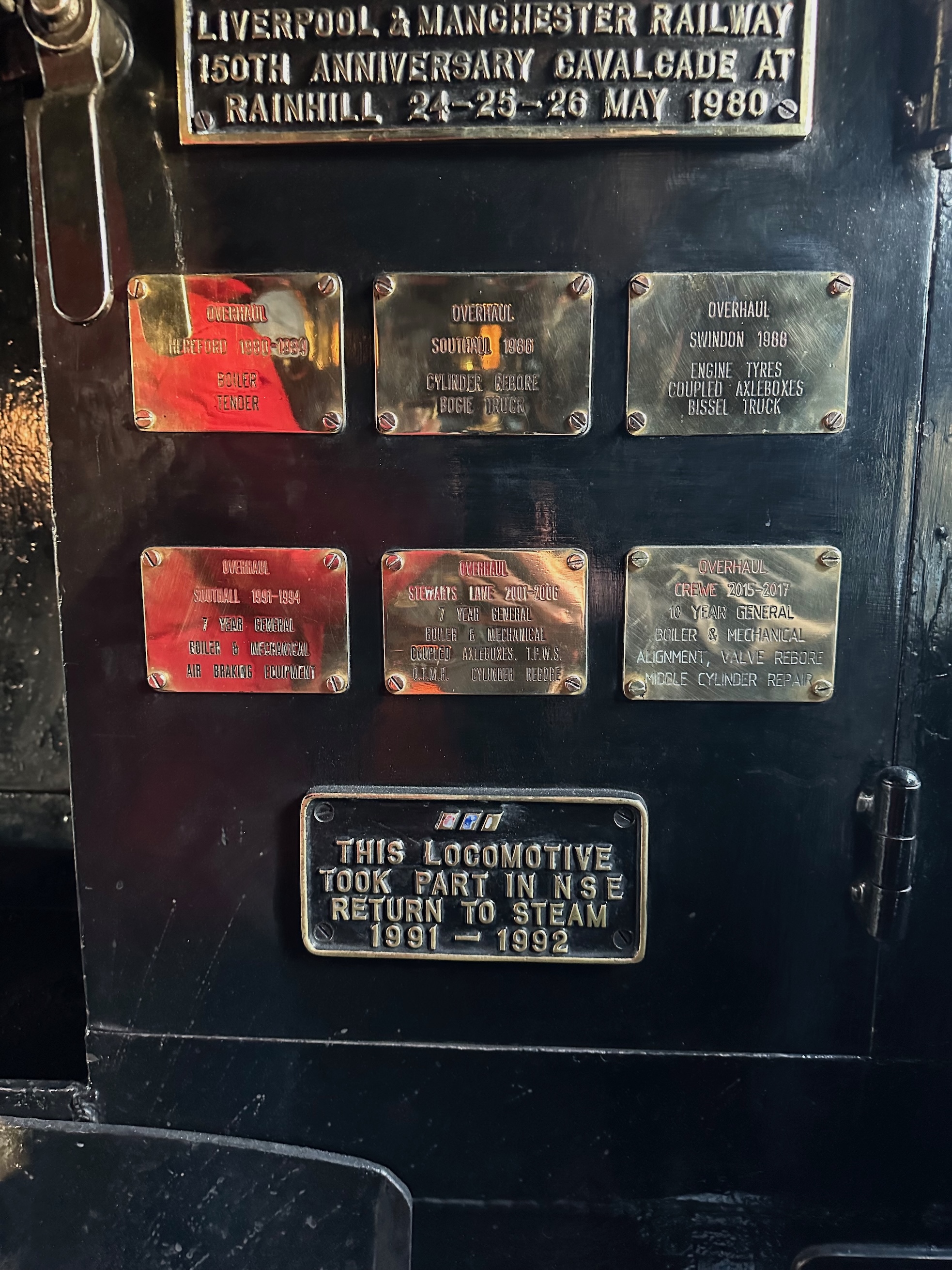 The plaques for overhauls at Hereford, Swindon, Southall, Stewart's Lane and Crewe. Also a plaque for taking part in NSE's Return to Steam.
