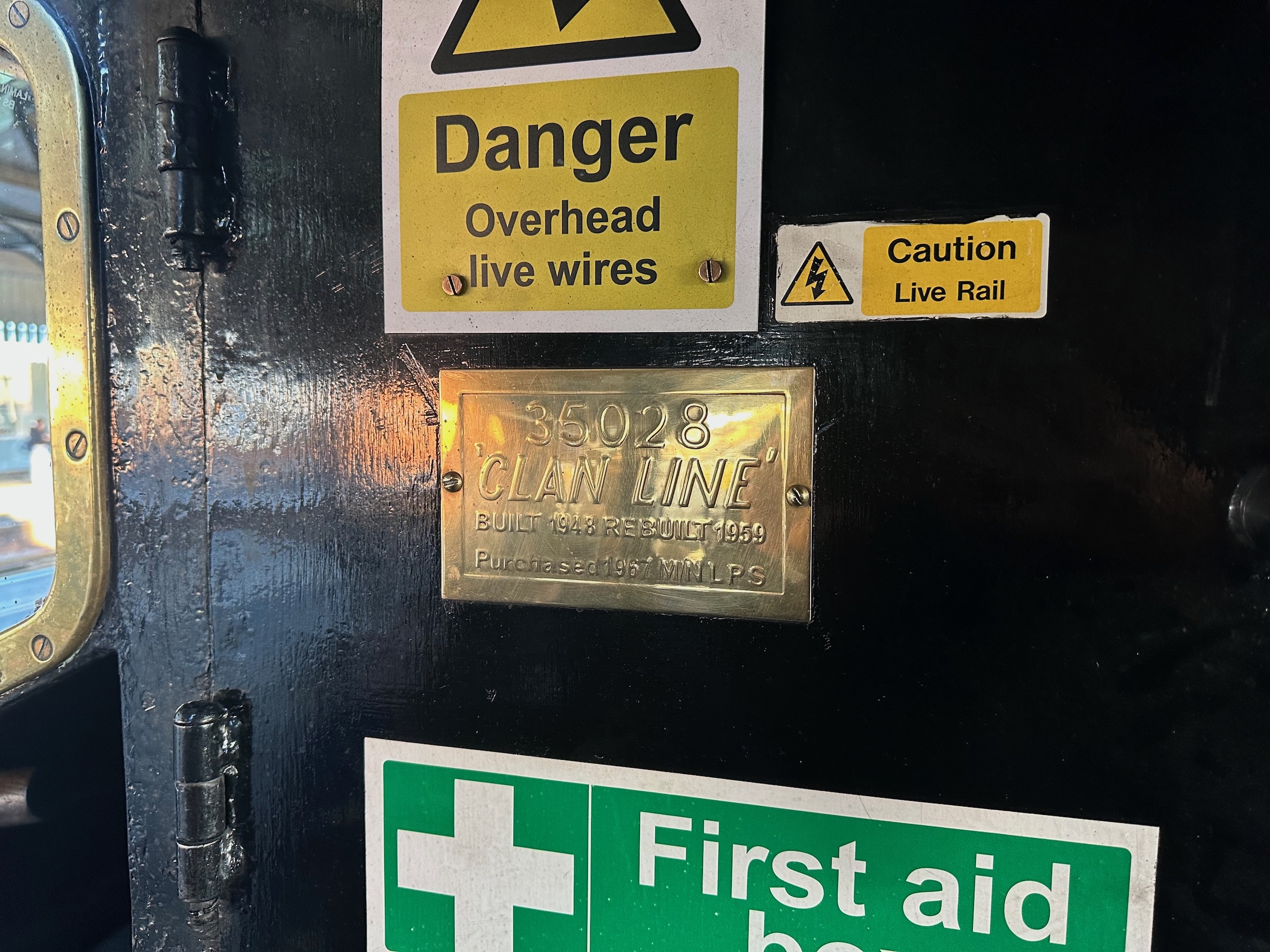 The plaque behind the fireman's seat with the number name and history of the locomotive.